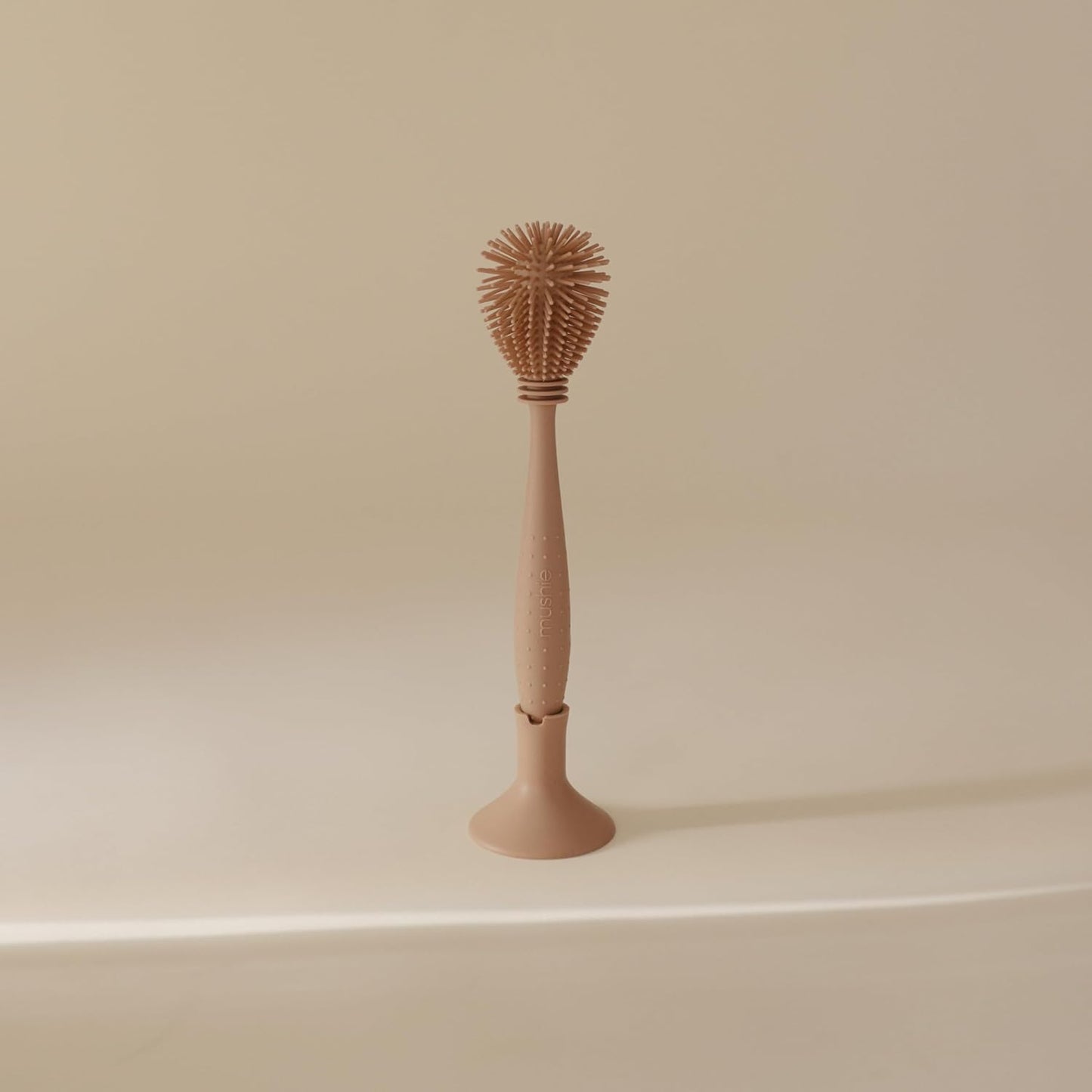 mushie Baby Bottle Brush | Soft Silicone with Suction Base (Shifting Sand)