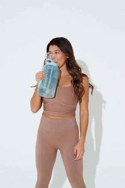 ZULU Goals 64oz Half Gallon Plastic Water Bottle with Straw and Time Marker | Large Reusable Jug with Handle and Leak Proof Lid for All Day Hydration, Gym and Outdoors, Gift Ready, Violet