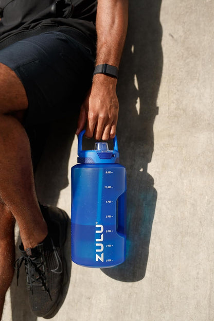 ZULU Goals 64oz Half Gallon Plastic Water Bottle with Straw and Time Marker | Large Reusable Jug with Handle and Leak Proof Lid for All Day Hydration, Gym and Outdoors, Gift Ready, Violet