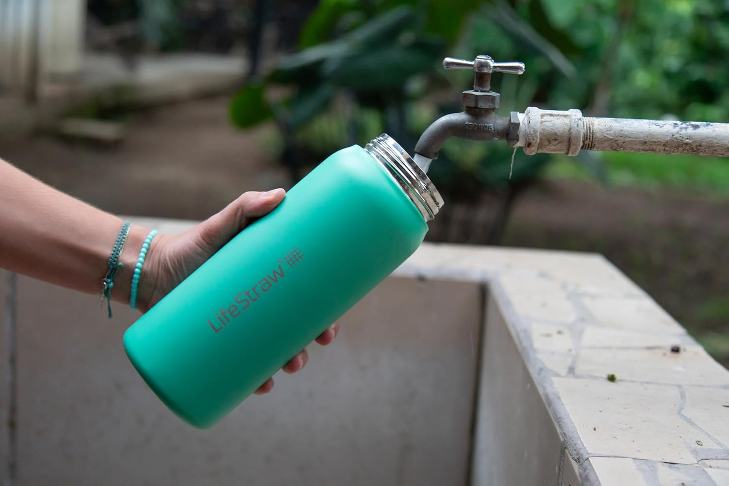 LifeStraw Go Series — Insulated Stainless Steel Water Filter Bottle for Travel and Everyday Use Removes Bacteria, Parasites and Microplastics, Improves Taste, 1L Aegan Sea
