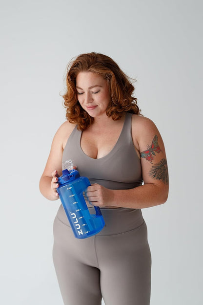 ZULU Goals 64oz Half Gallon Plastic Water Bottle with Straw and Time Marker | Large Reusable Jug with Handle and Leak Proof Lid for All Day Hydration, Gym and Outdoors, Gift Ready, Violet