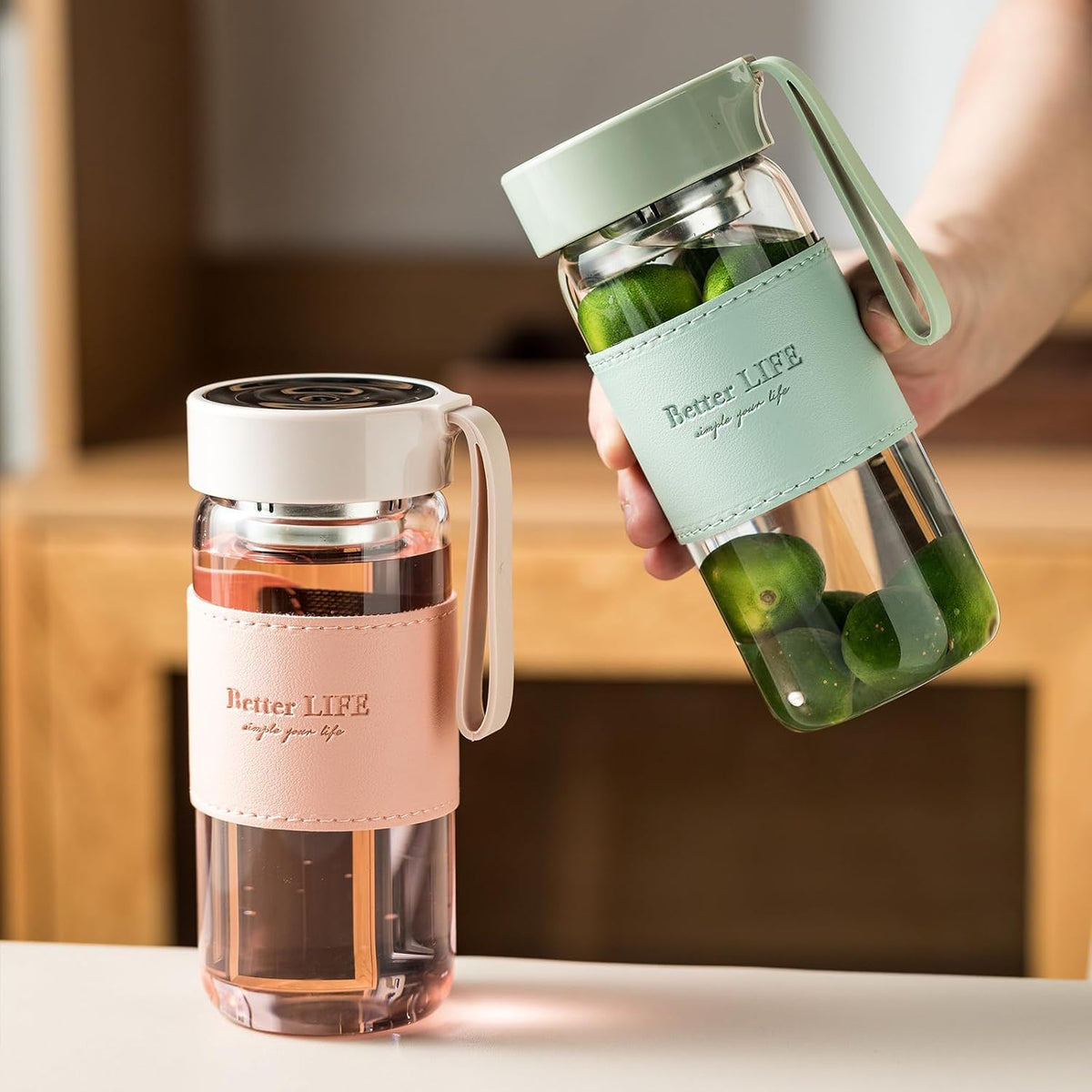 Glass Tea Bottle 16 oz Drinking Bottle with Non-Slip Holster, and Stainless Tea Infuser,Leak Proof Lid,Portable Glass Water Bottle for School, Office, Car & Home,as a gift, etc (Pink)