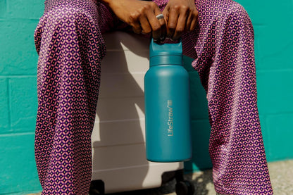 LifeStraw Go Series — Insulated Stainless Steel Water Filter Bottle for Travel and Everyday Use Removes Bacteria, Parasites and Microplastics, Improves Taste, 1L Aegan Sea